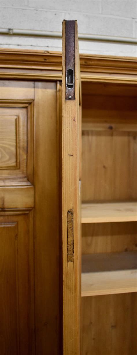 Then doorway to the living room. Pine Four-Door Knock-Down Armoire at 1stdibs