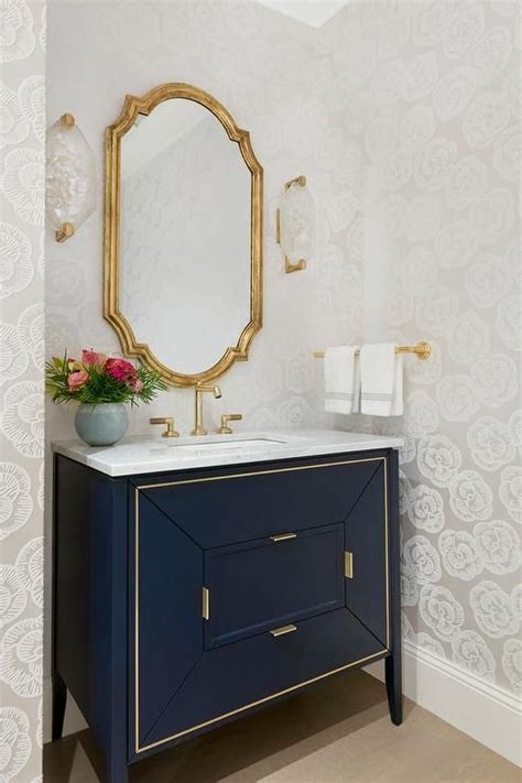 Luxurious Gold And Blue Bathroom Features A Blue Footed Bath Vanity