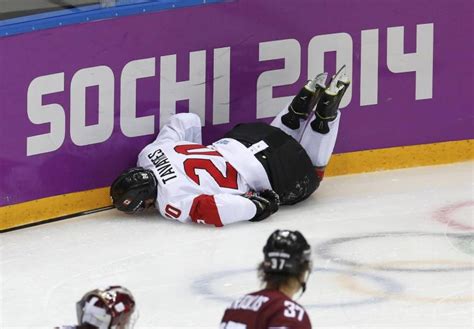 Maple leafs captain stretchered off ice after being kneed in head. Isles' Tavares done for rest of season after Olympic ...