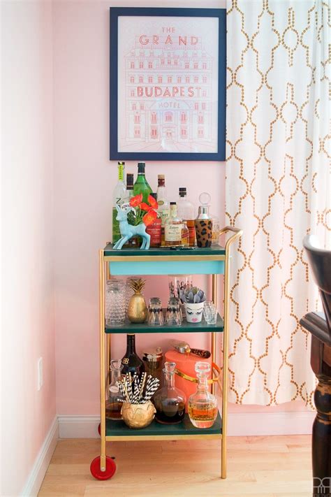 You don't need a lot of square footage to fit a home bar into your plans. A few small spring updates on the bar cart make for a ...