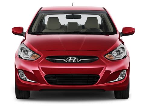 The hyundai accent was redesigned for the 2012 model year. Image: 2014 Hyundai Accent 4-door Sedan Auto GLS Front ...