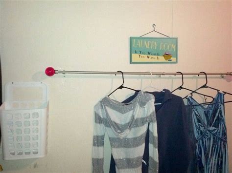 The most common drapery hangers material is metal. Curtain rod to hang clothes in the laundry room. Trash can ...