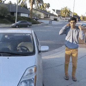 A 1969 dodge charger r/t sports car made famous by the dukes of hazzard tv show in the 1980s jumps in front of 100's during a stunt on feb. car GIFs - Primo GIF - Latest Animated GIFs