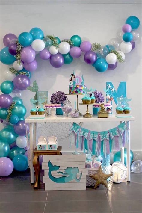 Pink & teal beach themed birthday party for kolbie's 4th birthday with pink seashells, starfish, clam cookies on brown sugar sand, popcorn cones & pink yarn! Mystical Mermaid Party | Kara's Party Ideas | Festa de ...