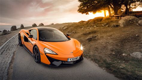 麥拉倫汽車（英語： mclaren automotive ）是一家總部位於英國 薩里郡 沃金的高性能跑車製造商。 該公司由紐西蘭人布魯斯·麥拉倫創立於1963年，以運用一級方程式賽車的工程和技術研發公路跑車而聞名。 邁凱輪570S橙色超級跑車前視圖 電腦桌布 | 2560x1440 桌布下載 | HK.HDWALL365.com