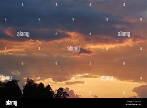 Bright Orange Sky With Clouds At Sunset Stock Photo Alamy