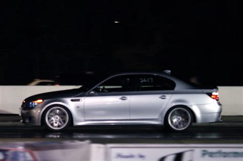 Узнай, сколько едет до сотни бмв м5. 2006 BMW M5 SMG 1/4 mile Drag Racing timeslip specs 0-60 ...