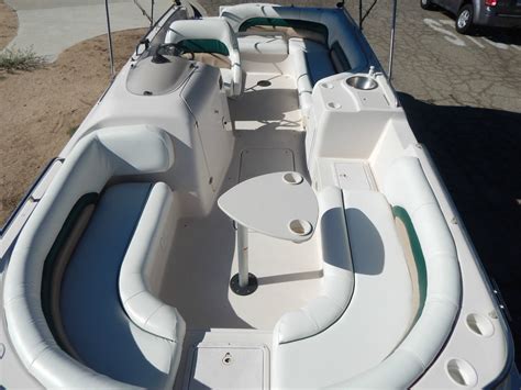 5 impenetrable layers of fabric for protection from rain, snow, hail, sun, dust and rust. Godfrey Hurricane Hurricane 237 Deck Boat 2002 for sale ...