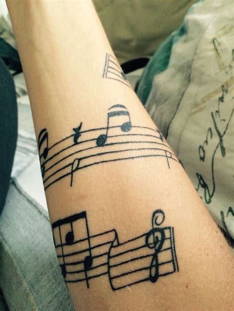 The tattoo thing is a thrilling craze; Sheet music tattoo | Music tattoos | Pinterest | Sheet music, Sheet music tattoo and Music tattoos