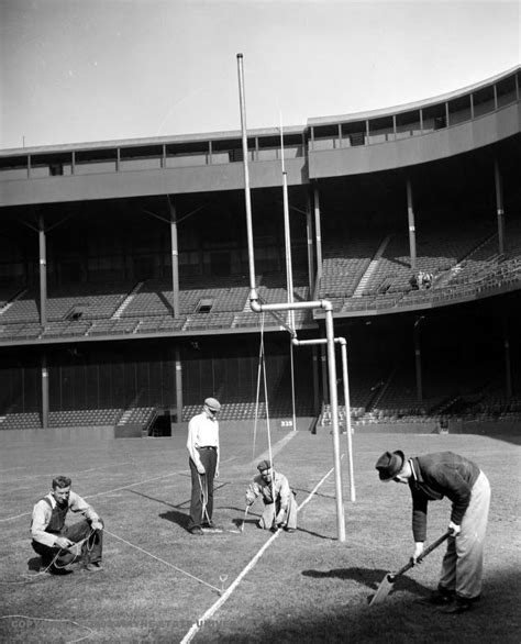 The Grounds Crew Marking The Lines For A Lions Game At Tiger Stadium