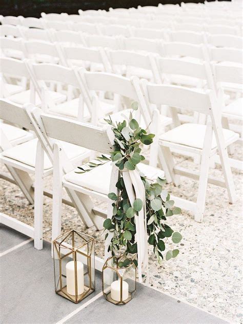 Lantern aisle decor, greenery // ceremony, chair, white, outdoor