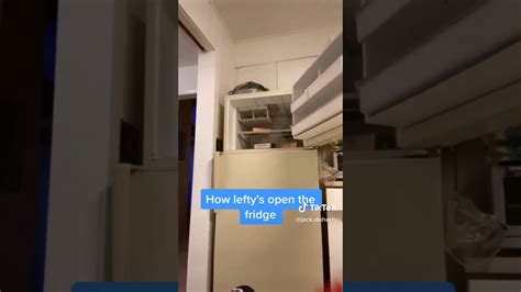 That's right, the door is bet. How left handed people open a fridge - YouTube