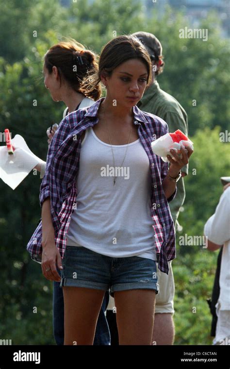 Mila Kunis Eats A Watermelon On The Set Of Friends With Benefits New