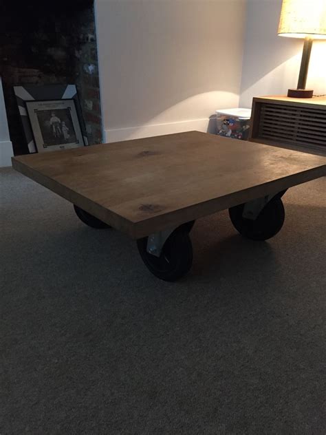 It is in excellent condition. Solid Oak Coffee Table On Wheels Vintage Industrial ...