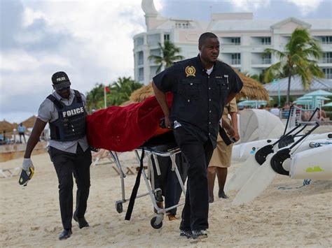 a us tourist died after being attacked by a shark while paddleboarding at a sandals resort in