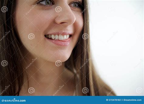 Nice Young Woman Is Looking Up Over White Background Close Up Happy