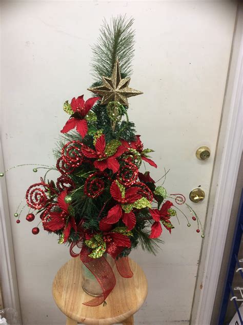 Anytime the old flowers have become faded. Cemetery Christmas Tree | Christmas floral, Christmas ...
