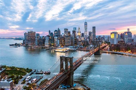 Aerial Of New York City And Brooklyn Bridge At Dusk High Res Stock