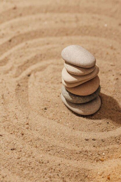 Premium Photo Stones Stack On Sand Zen Meditation
