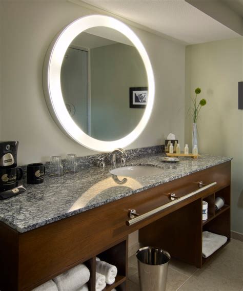 The cabinet is crafted from solid teak (ideal for bathrooms), and it has two mirrors, both of which are 21.875 x 24 inches and mounted on a convenient sliding door. Residential Lighted Mirrors by Electric Mirror now ...