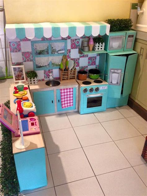 Forgoing the $100+ plastic kitchens, i diyed a play kitchen for my kids using a nightstand i found at a thrift store. You Won't Believe This Play Kitchen is Made Out of Boxes ...