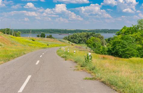 Landscape With Rural Road And Meadow At The Roadside Near Dnepr River