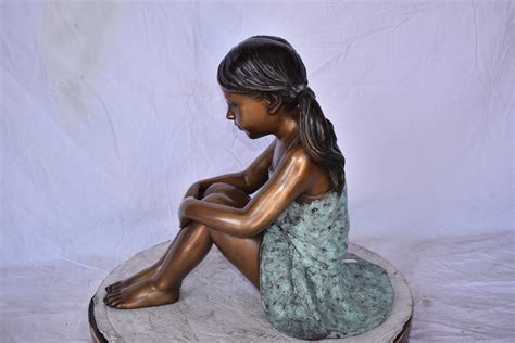 Canora Grey Girl Sitting On The Ground Enjoying The Sun Bronze Statues22 X 15 X 19h Wayfair