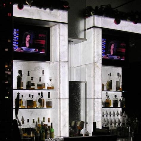 Buy top selling products like idesign® forma® over the cabinet towel bar in stainless steel and org™ bar shelves. Backlit White Onyx Bar Counter & Wall | GPI Design