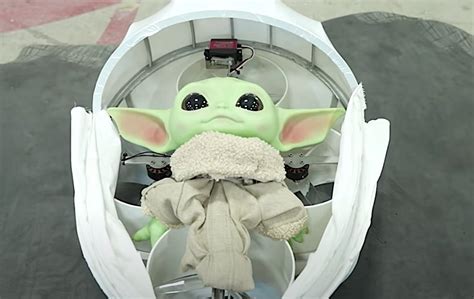 Drones Come Together To Become Working Baby Yoda Floating Cradle