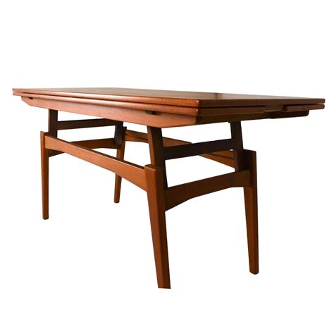 One of the simplest ways is to buy a. Danish Teak Convertible Dining / Coffee Table | Chairish