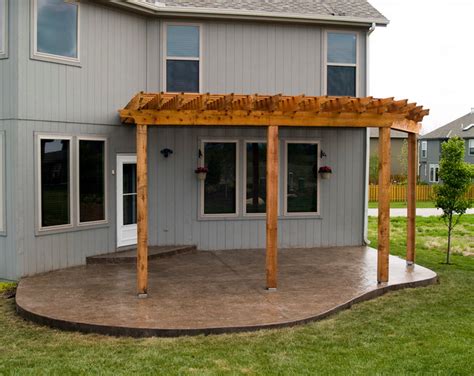 House Cedar Pergola With Stamped Concrete Patio Traditional