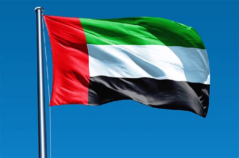People buying uae national flags as part of the preparation for uae flag day on november 1, at a shop near madinat zayed shopping center in abu dhabi on tuesday. 'Inspiring 49' chosen to design new UAE Nation Brand logo ...