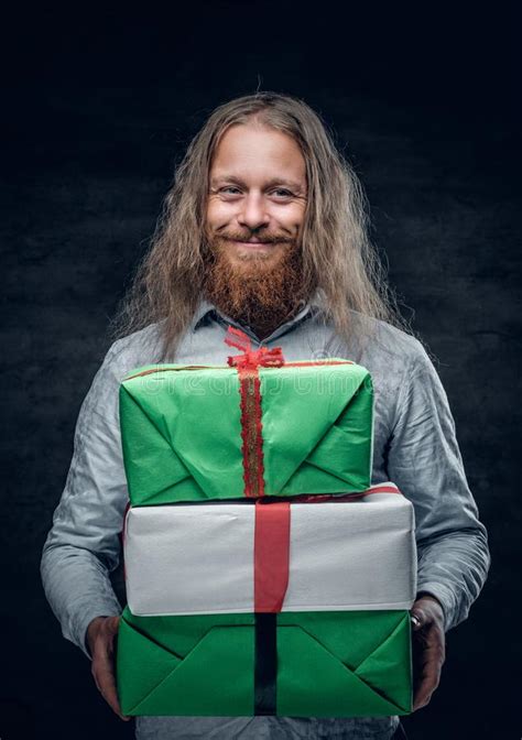 Bearded Man With Long Hair Holds The Present Box Stock Image Image Of Present Glamour 113030575
