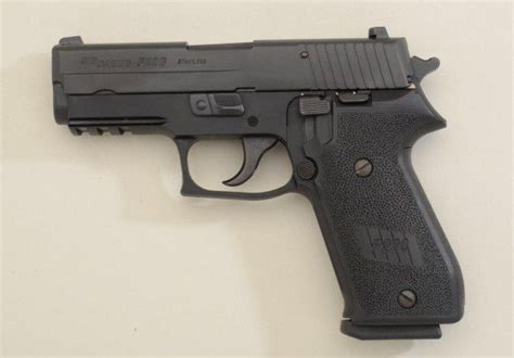 Sig Sauer Model P 220 Semi Auto Pistol 45 Cal With 3 Extra