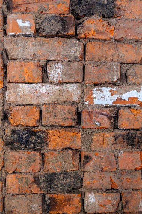 Different Red Bricks Are Laid In The Wall After Repair Stock Image