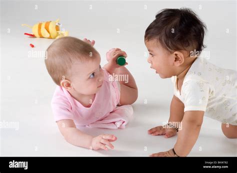 Two Babies Playing Together Stock Photo Alamy