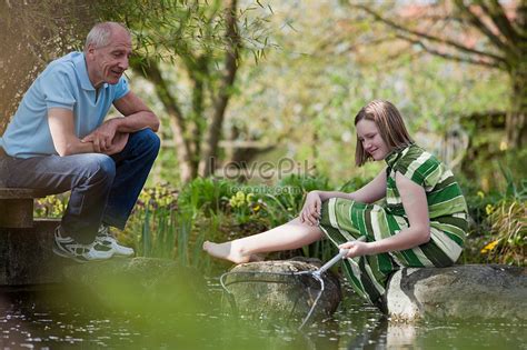 Old Man And Young Girl By The Pond Picture And Hd Photos Free