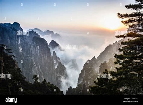 Fog Rolling Over Rocky Mountains Huangshan Anhui China Stock Photo
