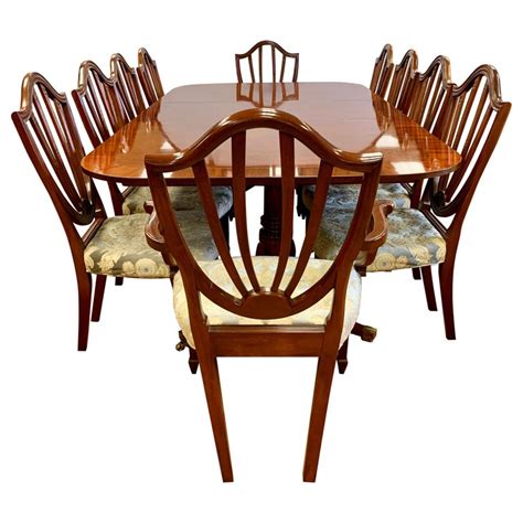 Complete your dining space with the warm, traditional style of the. Baker Furniture 11-Piece Dining Room Set Table and Ten Chairs Historic Charleston For Sale at ...