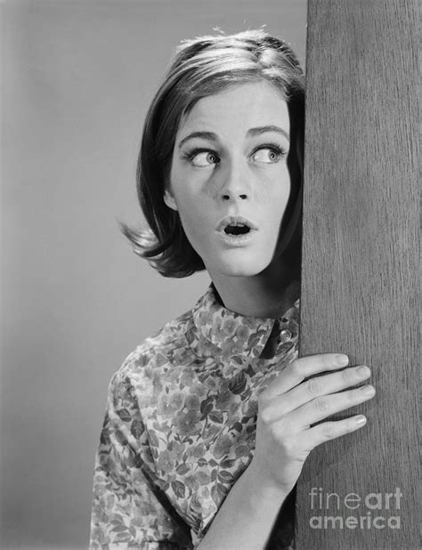Woman Peeking Around Corner C 1960s Photograph By H Armstrong Roberts Classicstock Fine Art