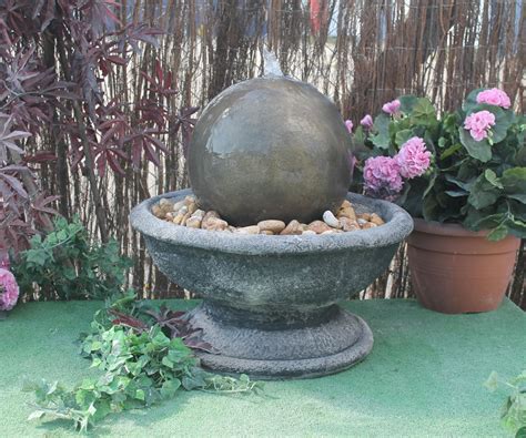 The company explains that each ornament 'is handmade in reconstituted stone by a special process, developed over our long history to ensure a finished texture virtually indistinghishable from natural. Patio Fountain With Modern Ball Sphere - Stone Garden ...