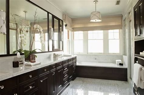 Rich Chocolate Brown Cabinetry And Mirrors Traditional Bathroom