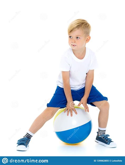 A Little Boy Is Playing With A Ball Stock Image Image Of Kick Ball