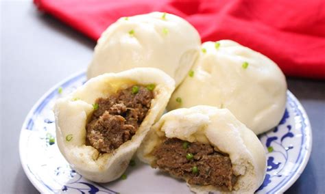 Chinese Steamed Pork Buns Served On A Plate As Part Of A Dim Sum Style