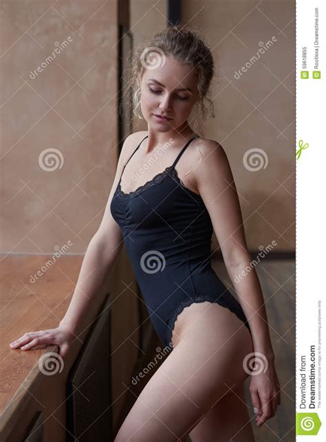 Portrait Of Young Woman Standing Near The Window Stock Image Image Of