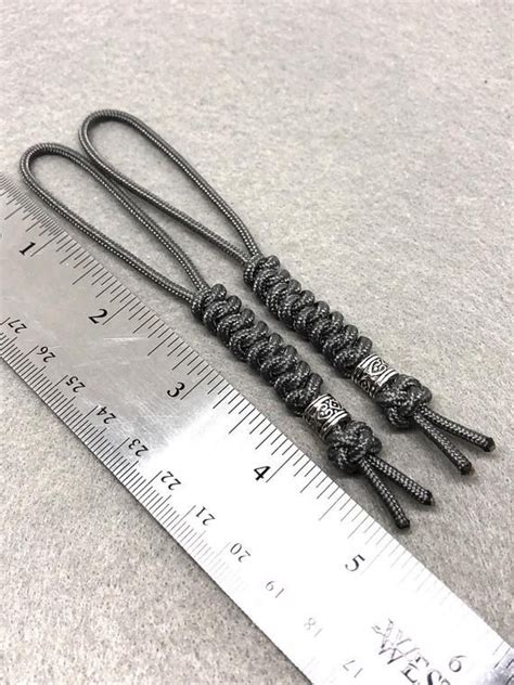 Saw something that caught your attention? 275 Paracord Knife Lanyard 2pk Graphite Cord Snake Knot With | Etsy in 2021 | Snake knot, Knife ...