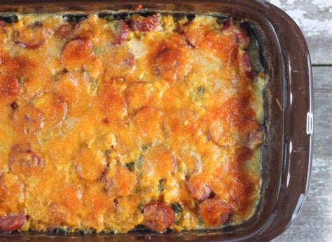 Stir sausage, tomatoes and reserved juice, onion, cheddar cheese, monterey jack cheese, 2 teaspoons olive oil, parsley, onion powder, garlic powder, salt, and ground black pepper together in a large bowl. Cheesy Smoked Sausage Vegetable Casserole - The Farmwife Cooks