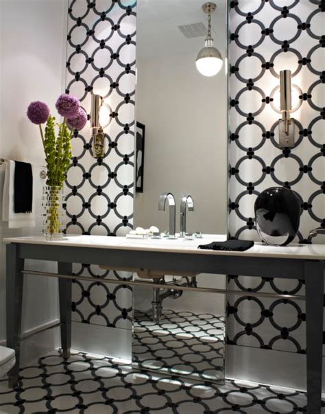 The Chic Black And White Wallpaper And Art Deco Lighting Make This A