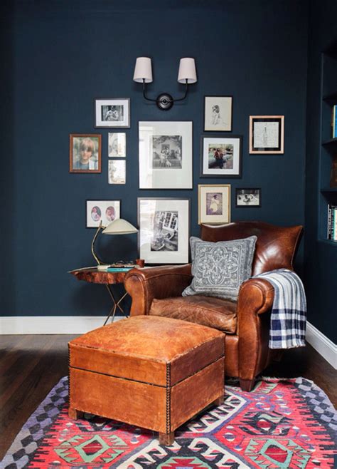 Make an offer on a great item today! Vintage leather chair in bourbon with navy walls and ...