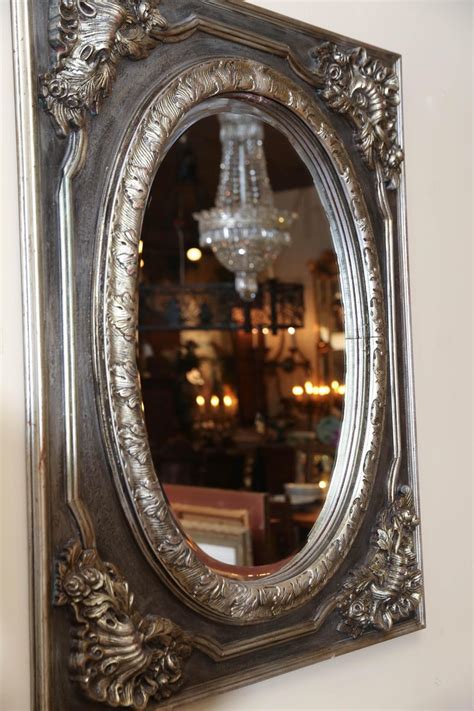 We did not find results for: Pair of Decorative Painted and Silver Gilt Mirrors with Oval Shape For Sale at 1stdibs
